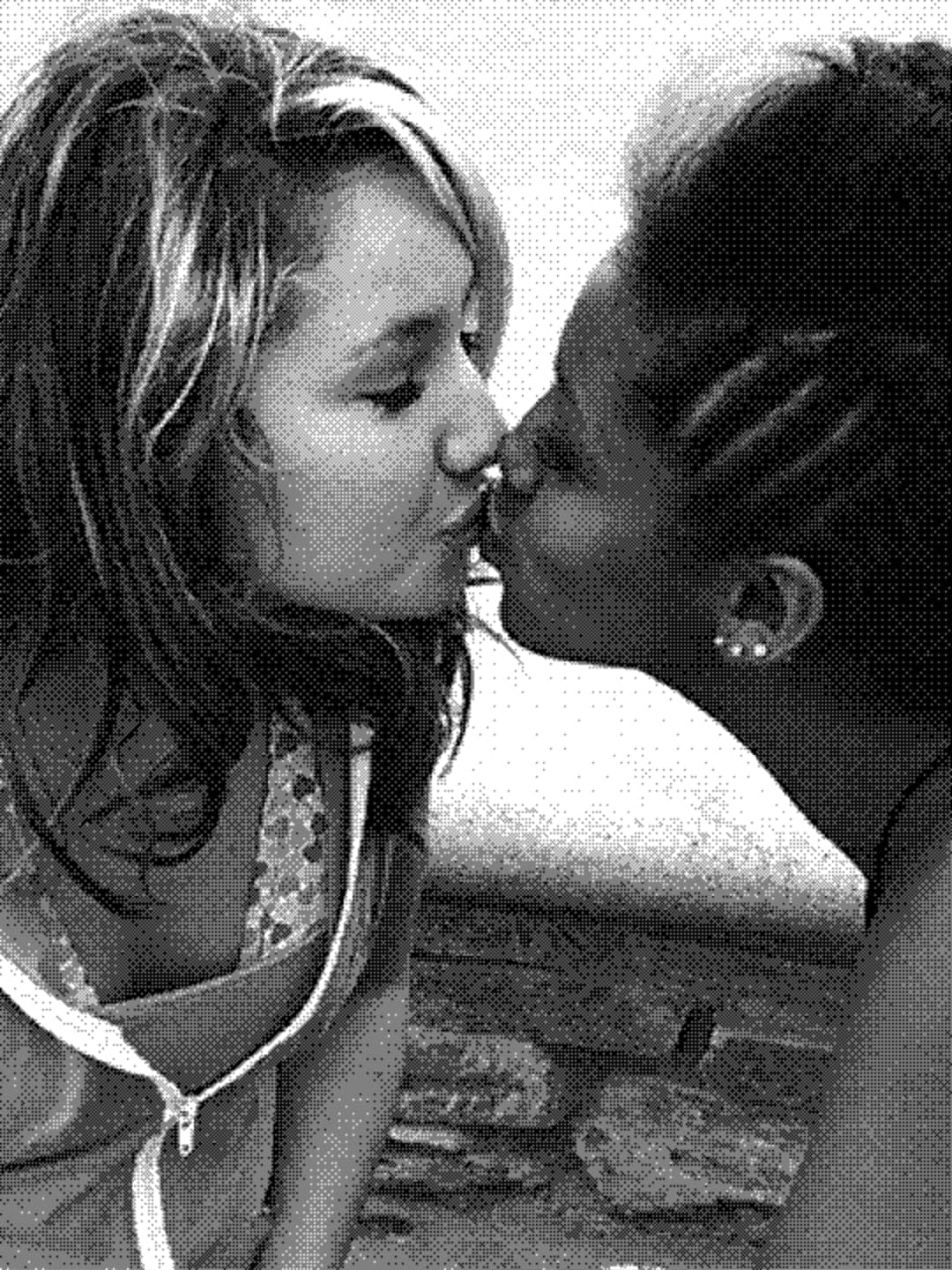 Two people kissing